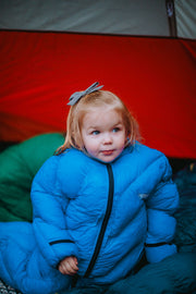 Toddler in Big Mo 40° Kids Sleeping Bag (Ages 2-4) Sitting in Tent Outside Camping Warm and Happy - Morrison Outdoors